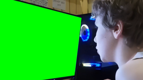 Boy getting angry and blowing at Monitor free green screen meme